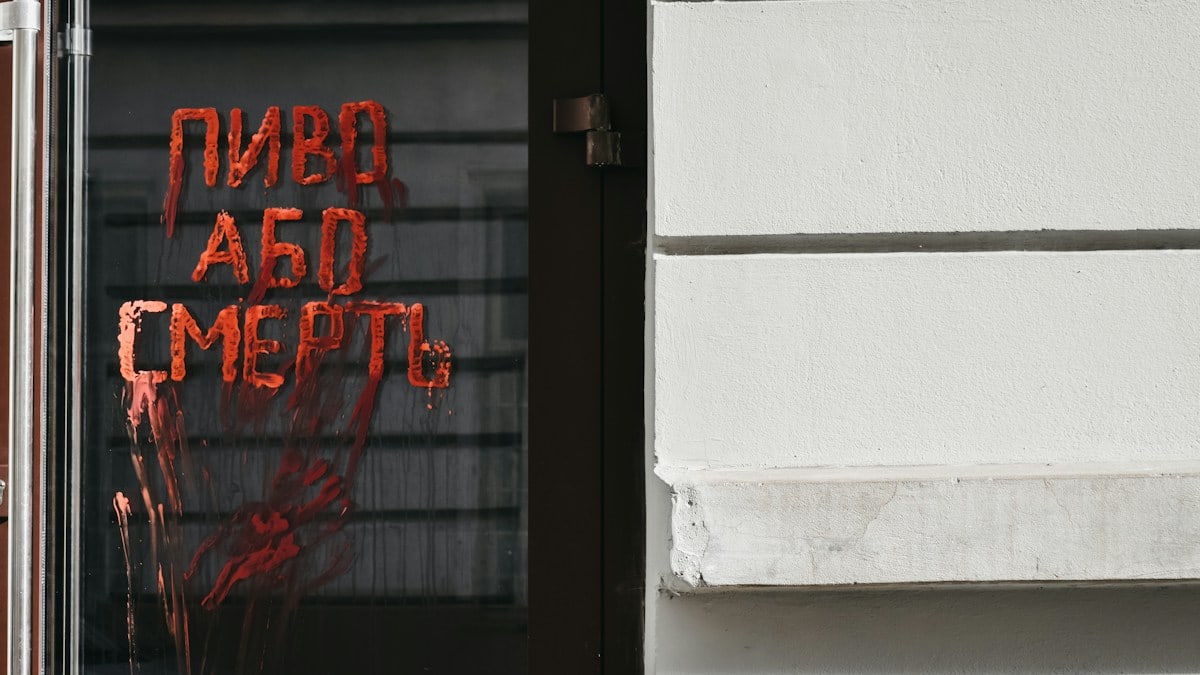closed door with red text